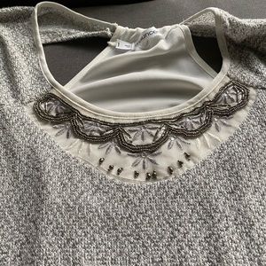 Sweater with detailing around neckline
